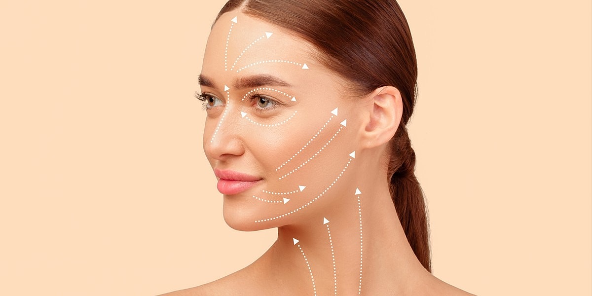 Facial massage technique illustrated with arrows.